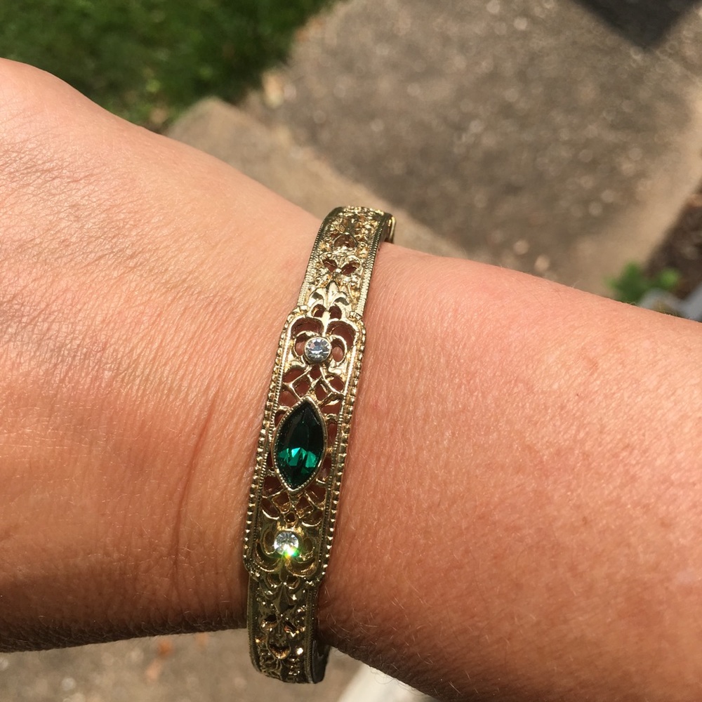 Gold plated bracelet with green stones
